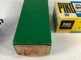 a box of film next to a box of tape on a table