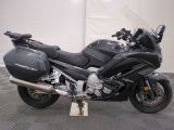 a picture of a motorcycle parked in a garage