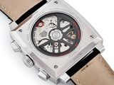 a close up of a wrist watch on a white surface