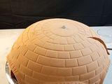 a star wars death star cake sitting on a table