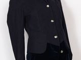 an image of a mannequin wearing a black suit with gold buttons