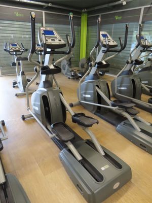 many different types of exercise machines in this gym