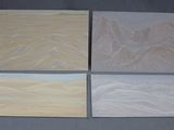 four different types of wood panels on a gray background