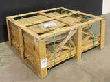 a wooden crate that has a bunch of items inside of it