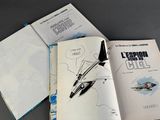 a book with a drawing of a jet on it