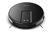 a close up of a robotic vacuum cleaner on a white surface