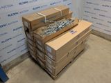 several boxes of assorted items stacked on top of each other in front of a wall