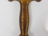 an image of a gold colored sword on a white background