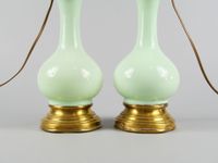 Deux lampes à pétrole en céramique émaillée couleur vert cél… (photo 2)