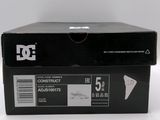 a black box with a white logo on it sitting on a white surface