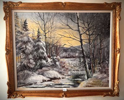 a painting of a snowy landscape hanging on a wall