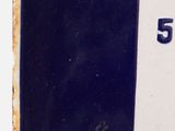 a picture of a close up of a sign for a gas station