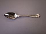 a spoon that is sitting on a table