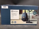an image of a box of a vacuum cleaner on a table