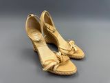 paire de sandales à talons compensés beiges pour femme, ornées de nœuds sur le bout