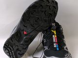 a close up of a pair of shoes on a white surface