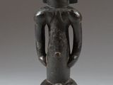 an image of a statue of a woman with a head on her back