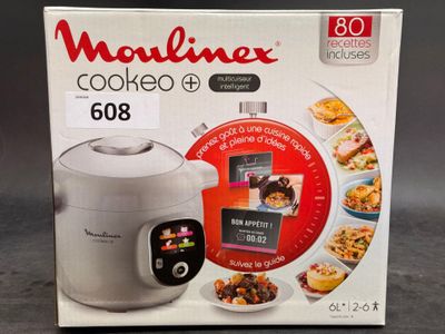 an image of a boxed box of cooking equipment on a table