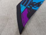 a neck tie with a picture of a man on it