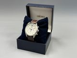 seiko watch in a box with a blue bow tie