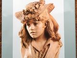 a book with a picture of a woman wearing a hat