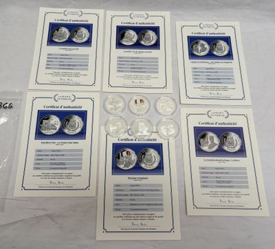Six pièces de 25 cents des États-Unis sont présentées dans un coffret