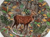 a plate with a picture of a deer on it