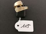 a close up of a ring with a tag on it