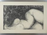 a black and white picture of a naked woman in the grass