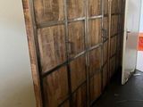 an image of a room with a bunch of wooden cabinets
