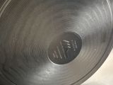 a metal pan with a label on it sitting on a counter