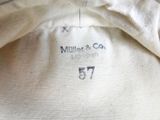 a close up of a white shirt with a label on it