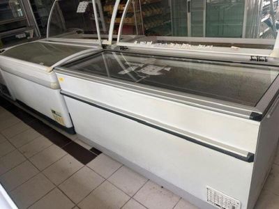 two refrigerated refrigerates in a store