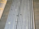 a lot of different types of steel bars on the floor