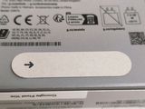 a close up of the back of a box with a sticker on it