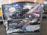 a metal cart with many items in it in a warehouse