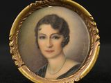 a close up of a picture of a woman in a black dress