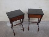 two small tables that are sitting next to each other