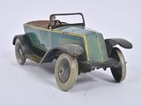 a toy car that is sitting on a white surface