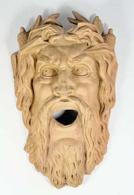 a sculpture of a man with a beard and a crown of thorns on his head