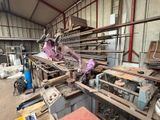a man that is working on a machine in a building