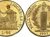 a gold coin with a statue on top of it