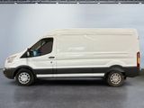 a white van that is parked in a garage