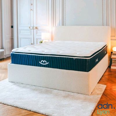 an image of a mattress on a bed frame in a bedroom