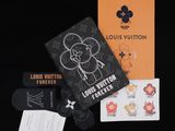 louis vuitton passport cover with stickers and stickers on a black background