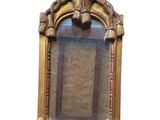 a mirror that is sitting on the wall