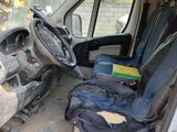 the interior of a van that has been vandalized by a truck driver