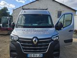 a van that is parked in front of a building