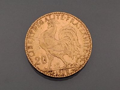 an image of a gold coin with a rooster on it ' s side