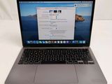 an apple macbook pro laptop computer sitting on top of a white table